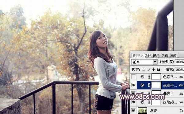 Photoshop将景区人物图片调制出淡淡的蓝黄秋季色